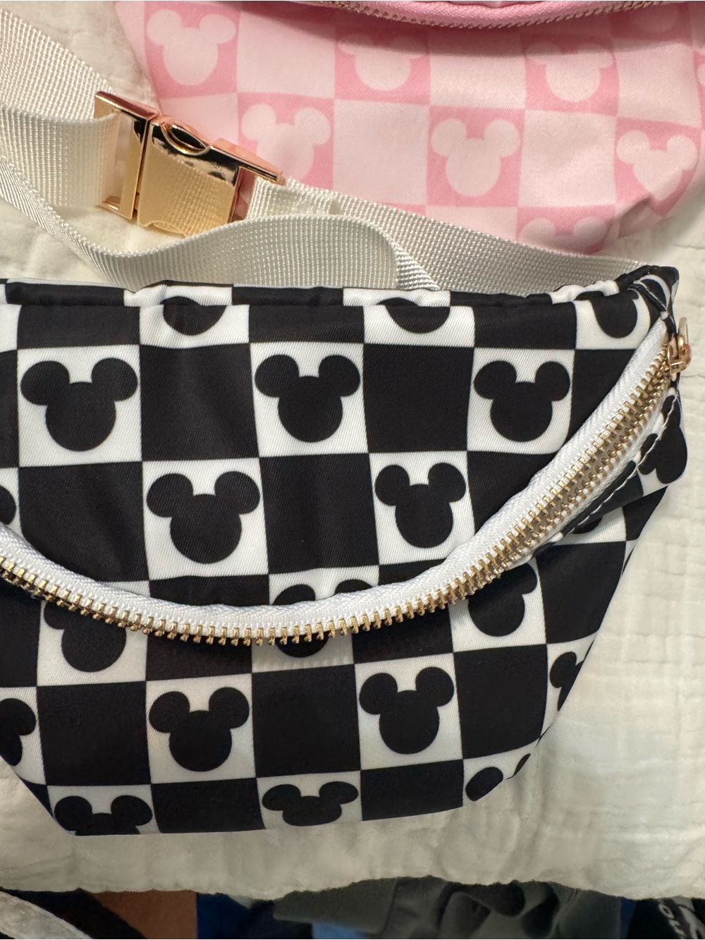 Two Disney Fanny packs: Black & White and pink Mickey Checker Fanny Packs